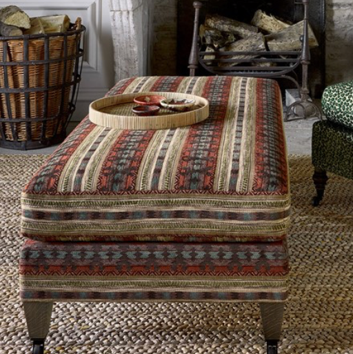 Ottoman upholstered in Dorian by Colefax and Fowler. Would look great on a headboard.