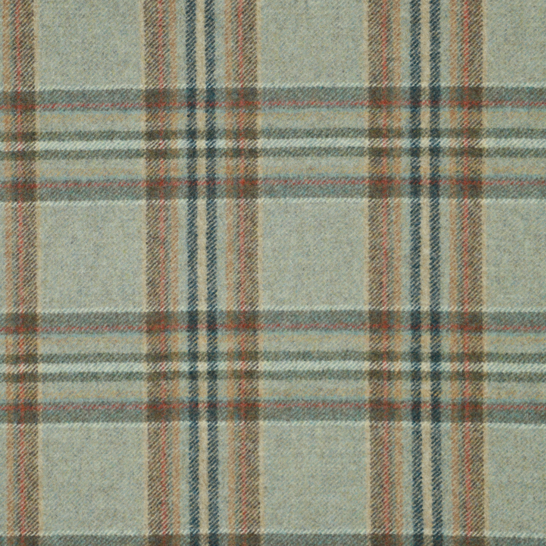 Plaid fabric pattern with brown, red, and blue colors on a light gray background