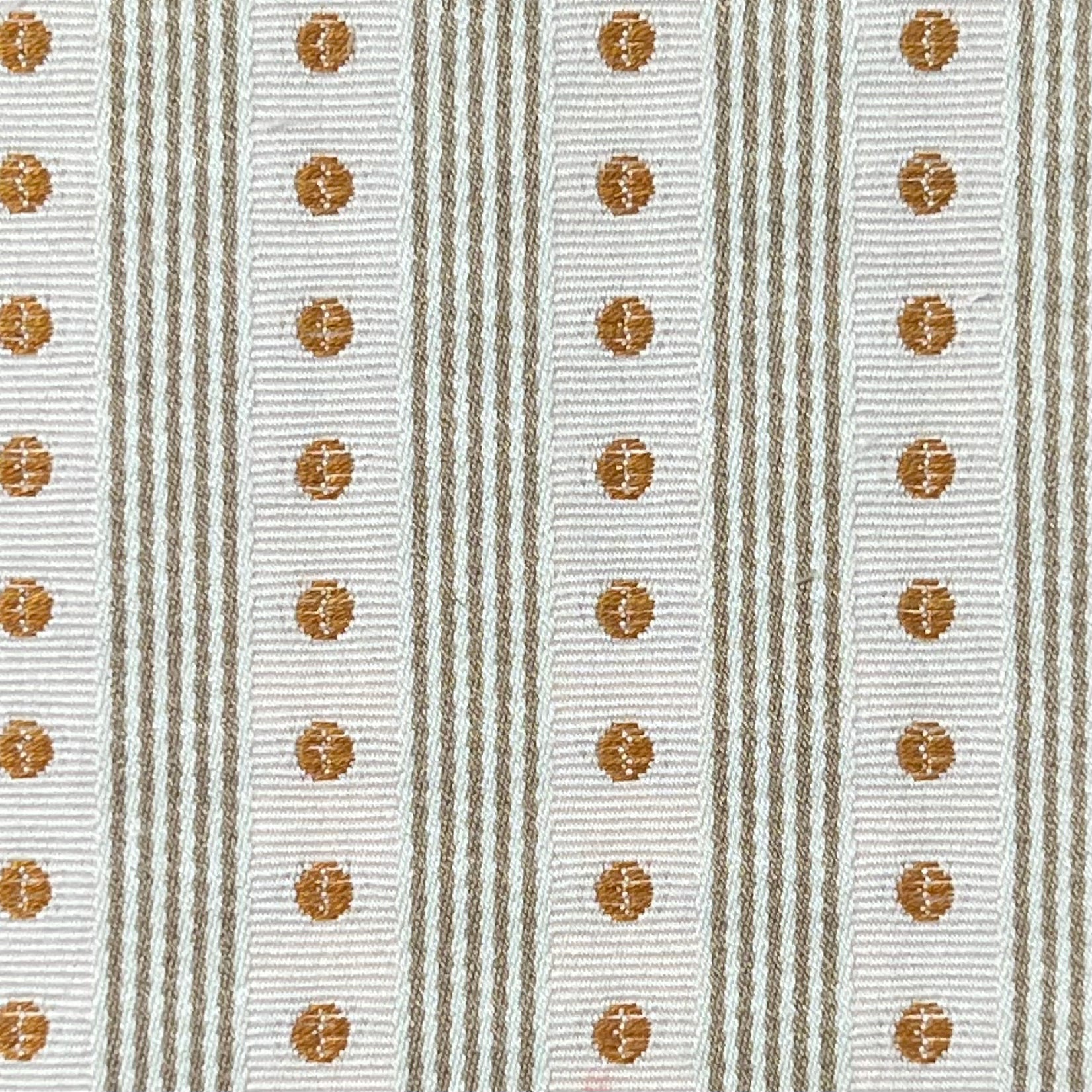 Textile pattern with brown circular designs on a striped background