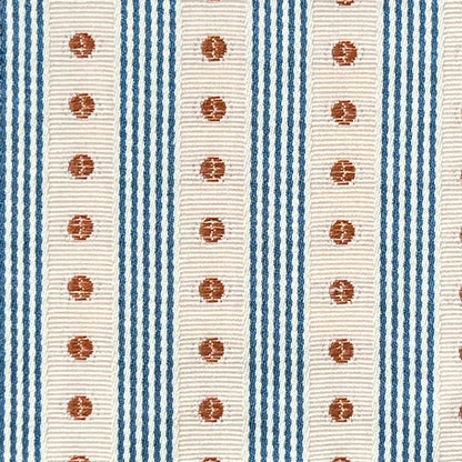 Textile pattern with blue and beige stripes and red circular designs.