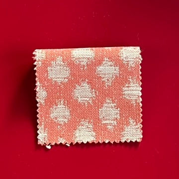 Juno fabric from Jance Churchill  in Coral color