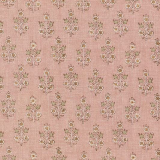 Headboard in a small scaled floral pattern on a blush pink backdrop. 
